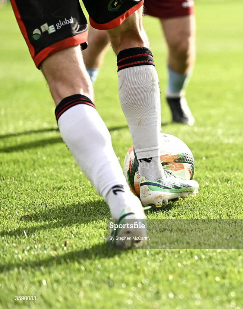 10 October 2026; A detailed view of a Derry City player and the matchball during the Club Orange Men's FAI Cup semi-final match between Galway and Derry City at Eamonn Deacy Park in Galway. Photo by Stephen McCarthy/Sportsfile