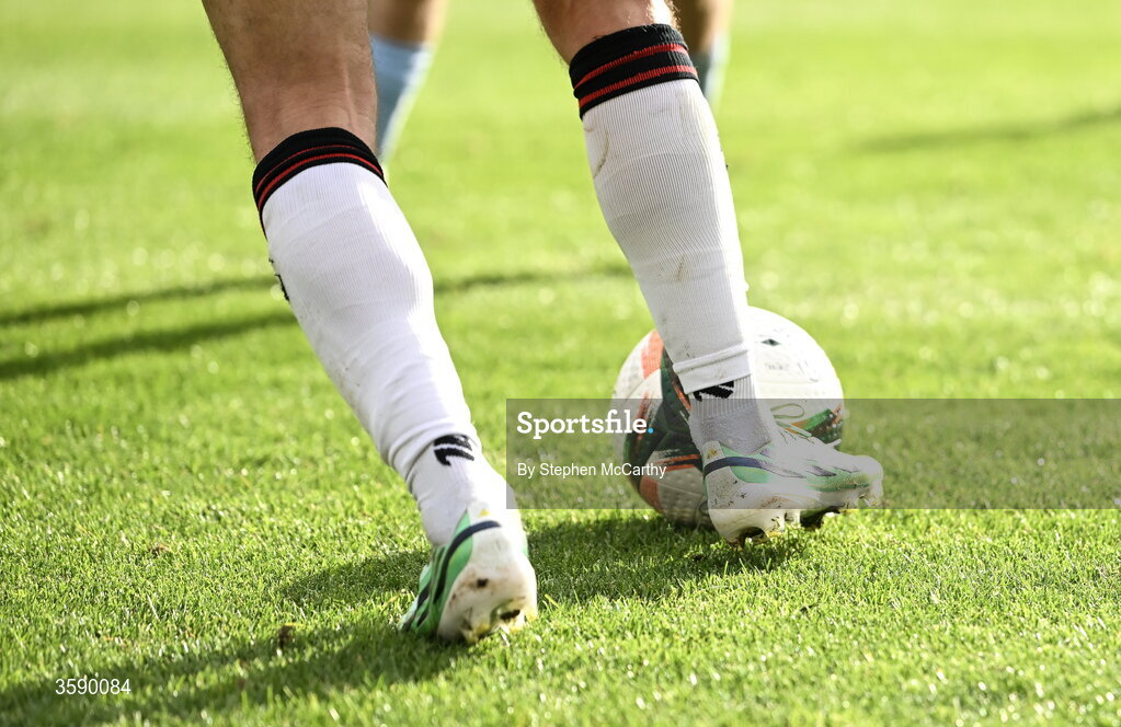10 October 2026; A detailed view of a Derry City player and the matchball during the Club Orange Men's FAI Cup semi-final match between Galway and Derry City at Eamonn Deacy Park in Galway. Photo by Stephen McCarthy/Sportsfile