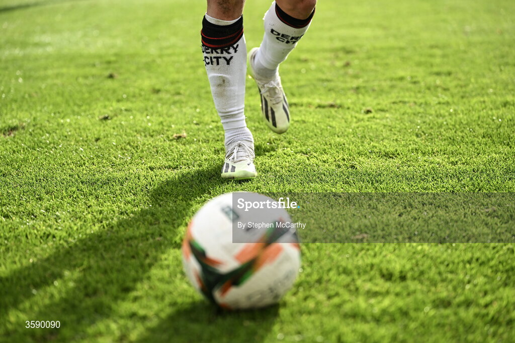 10 October 2026; A detailed view of a Derry City player and the matchball during the Club Orange Men's FAI Cup semi-final match between Galway and Derry City at Eamonn Deacy Park in Galway. Photo by Stephen McCarthy/Sportsfile