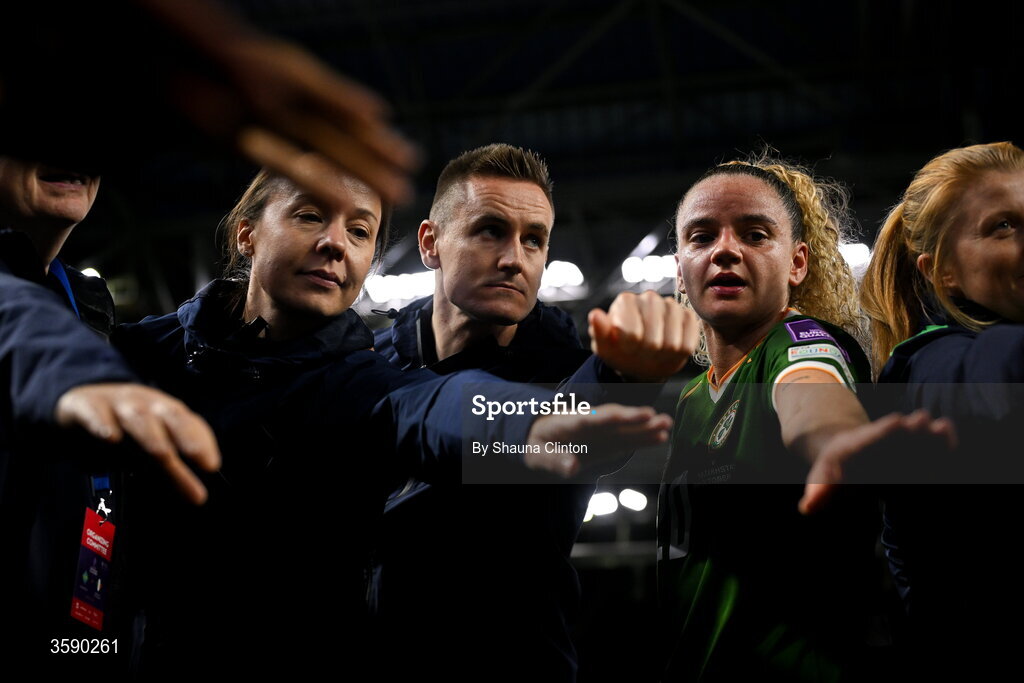 9 October 2026; Leanne Kiernan of Republic of Ireland, centre, and Republic of Ireland backroom staff, from left, Angela Kenneally, Ronan Molloy and Holly Pickett after the 2027 FIFA Women’s World Cup qualifying round 1 play-off first leg match between Kazakhstan and the Republic of Ireland at Astana Arena in Kazakhstan. Photo by Shauna Clinton/Sportsfile