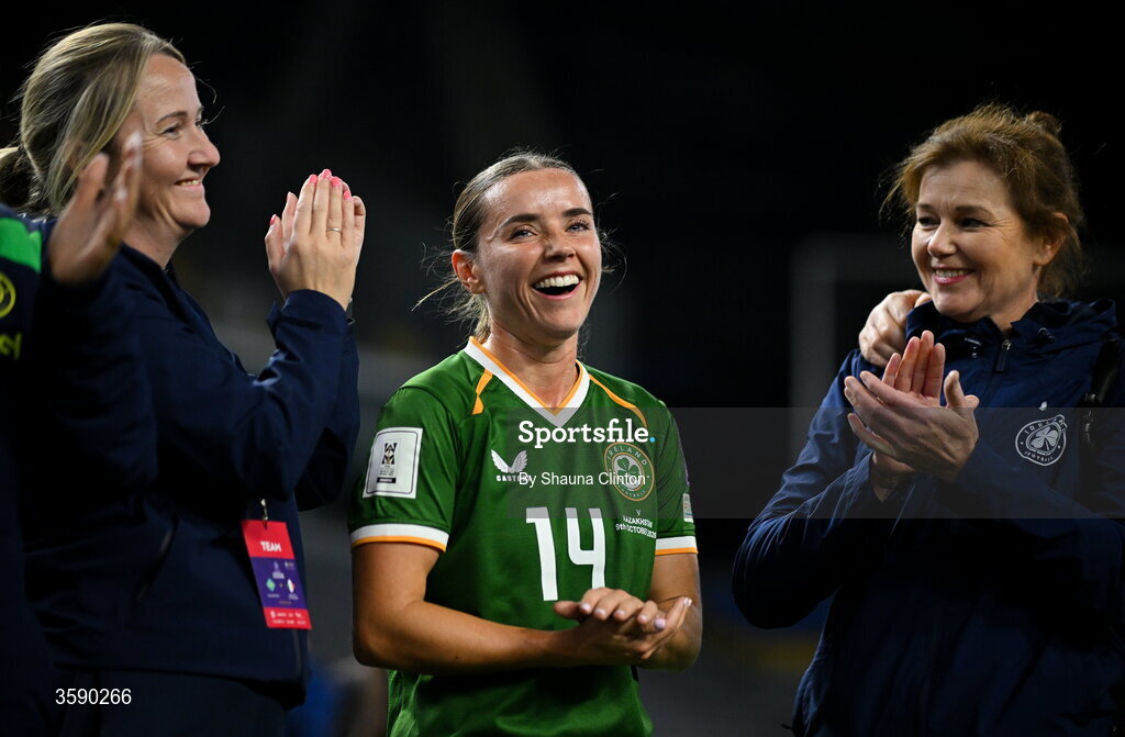 9 October 2026; Republic of Ireland debutant Shanade Hopcroft, centre, is congratulated by Republic of Ireland equipment officer Ciara Ennis, left, and team doctor Siobhán Forman after the 2027 FIFA Women’s World Cup qualifying round 1 play-off first leg match between Kazakhstan and the Republic of Ireland at Astana Arena in Kazakhstan. Photo by Shauna Clinton/Sportsfile