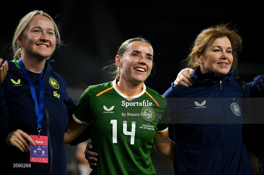 9 October 2026; Republic of Ireland debutant Shanade Hopcroft, centre, is congratulated by Republic of Ireland equipment officer Ciara Ennis, left, and team doctor Siobhán Forman after the 2027 FIFA Women’s World Cup qualifying round 1 play-off first leg match between Kazakhstan and the Republic of Ireland at Astana Arena in Kazakhstan. Photo by Shauna Clinton/Sportsfile