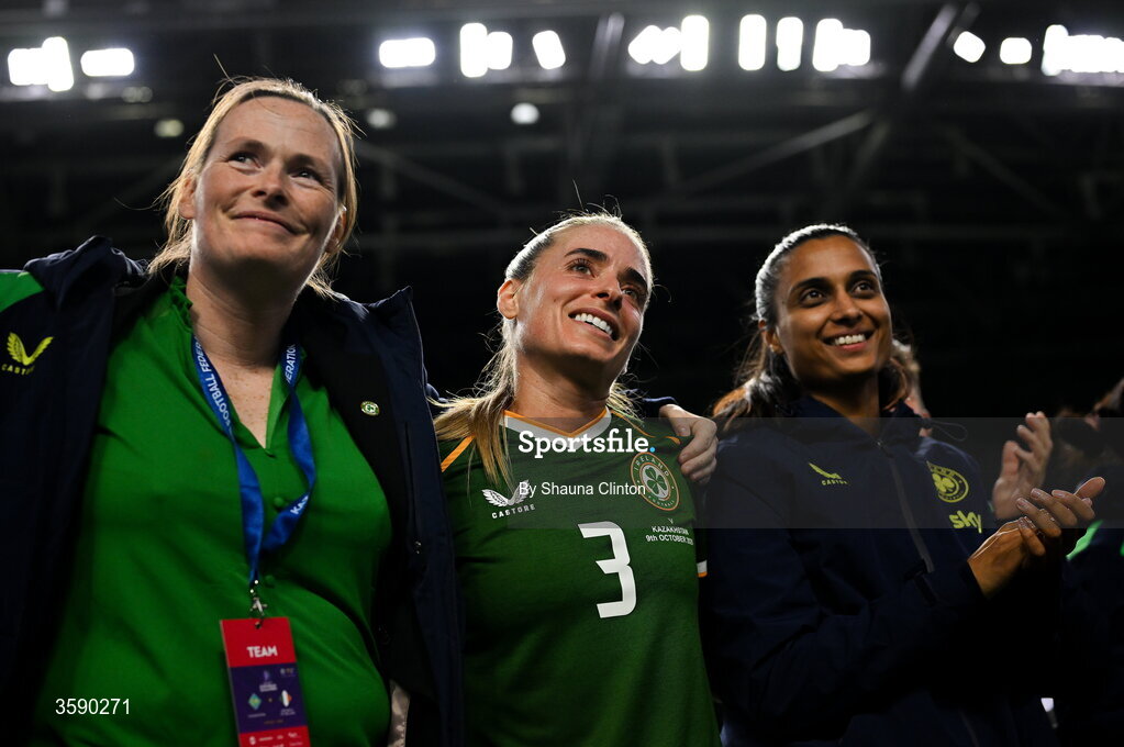 9 October 2026; Chloe Mustaki of Republic of Ireland, centre, is joined by Republic of Ireland team operations coordinator Denise McElhinney, left, and Republic of Ireland performance analyst Jasmine Mander after the 2027 FIFA Women’s World Cup qualifying round 1 play-off first leg match between Kazakhstan and the Republic of Ireland at Astana Arena in Kazakhstan. Photo by Shauna Clinton/Sportsfile