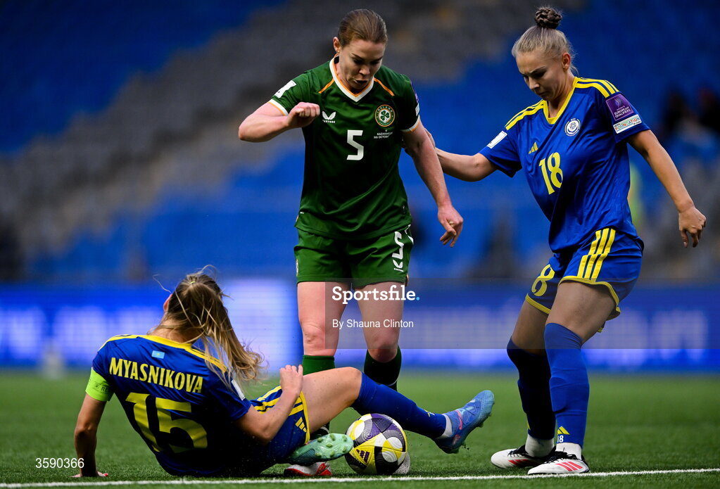 9 October 2026; Aoife Mannion of Republic of Ireland in action against Yulia Myasnikova, left, and Alexandra Burova of Kazakhstan during the 2027 FIFA Women’s World Cup qualifying round 1 play-off first leg match between Kazakhstan and the Republic of Ireland at Astana Arena in Kazakhstan. Photo by Shauna Clinton/Sportsfile