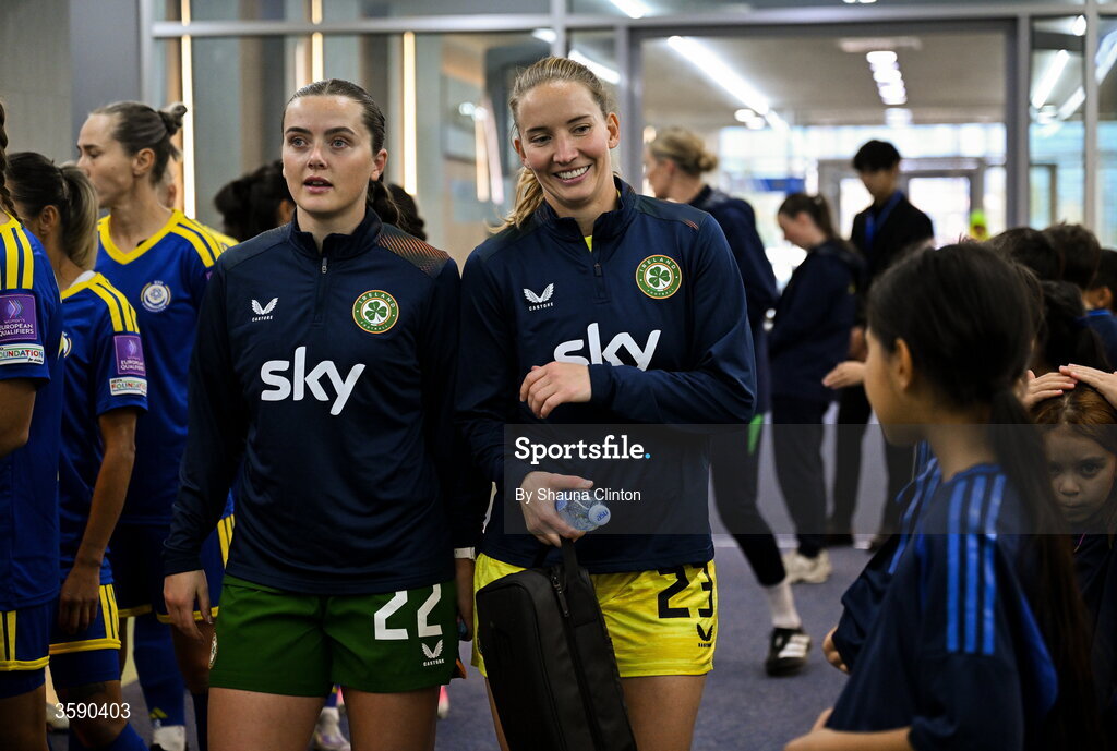 9 October 2026; Republic of Ireland players Tyler Toland, left, and Sophie Whitehouse with mascots before the 2027 FIFA Women’s World Cup qualifying round 1 play-off first leg match between Kazakhstan and the Republic of Ireland at Astana Arena in Kazakhstan. Photo by Shauna Clinton/Sportsfile