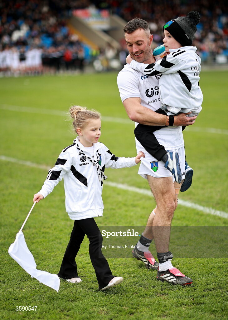 11 October 2026; Niall Donoher of Courtwood with daughter sophie, age 5, and son Dan, age 7, in the parade before the Laois County Senior Club Football Championship final match between Courtwood and Portarlington at Laois Hire O'Moore Park in Portlaoise, Laois. Photo by Thomas Flinkow/Sportsfile
