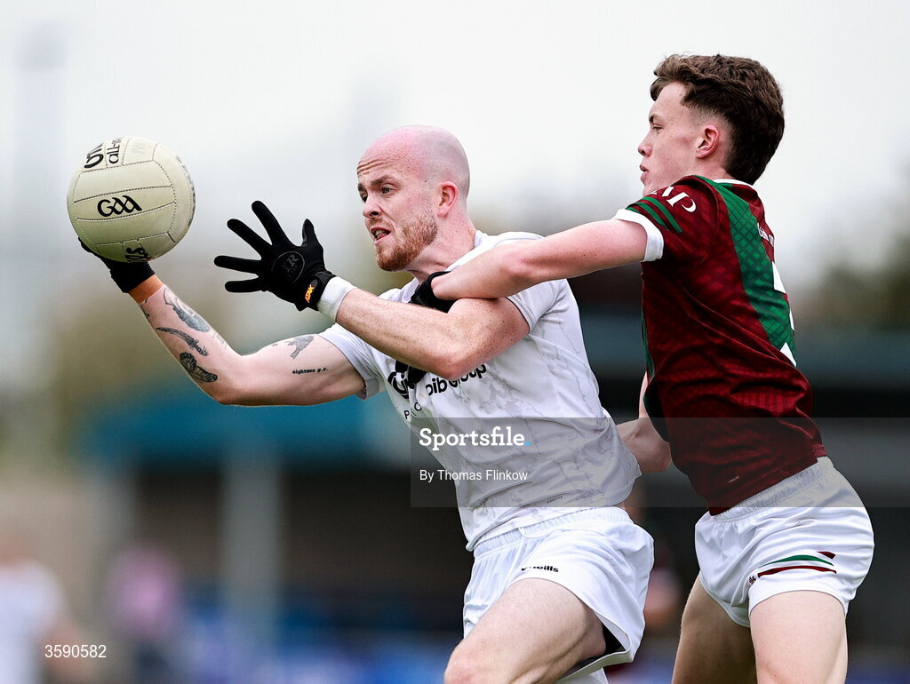 11 October 2026; Cian Doyle of Courtwood in action against Tom Corcoran of Portarlington during the Laois County Senior Club Football Championship final match between Courtwood and Portarlington at Laois Hire O'Moore Park in Portlaoise, Laois. Photo by Thomas Flinkow/Sportsfile