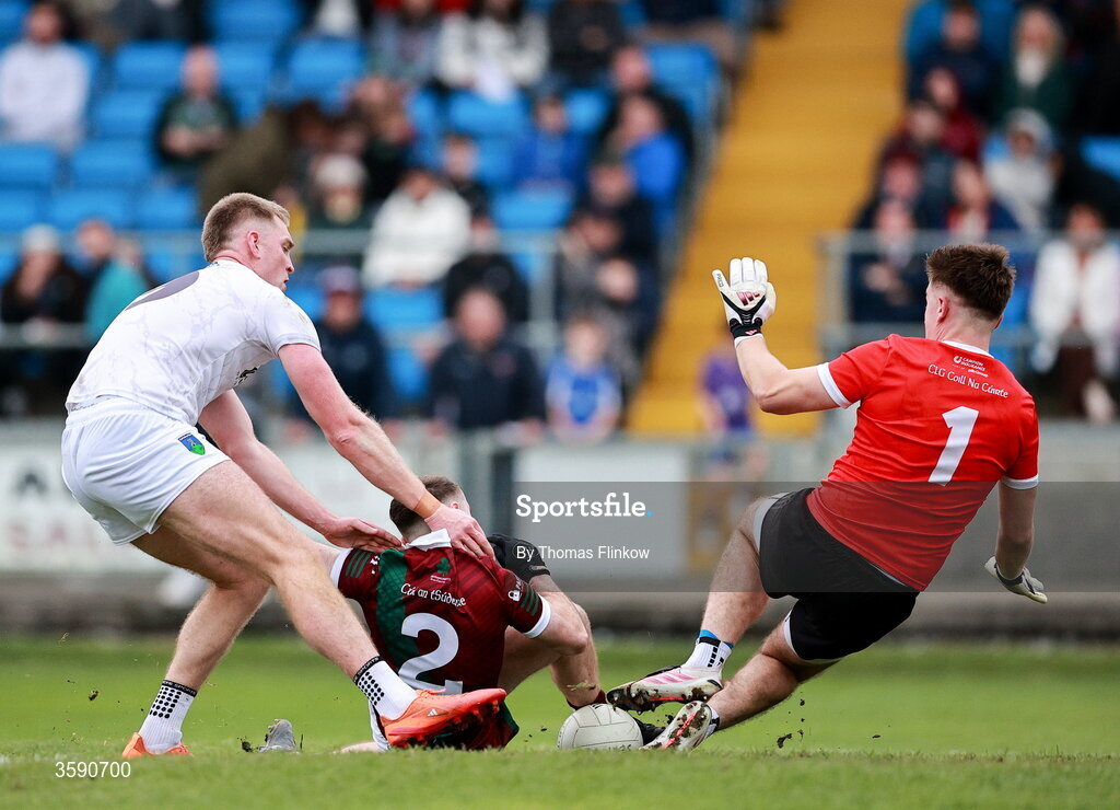 11 October 2026; Alex Mohan of Portarlington has a shot on goal denied by Courtwood goalkeeper Matthew Byron during the Laois County Senior Club Football Championship final match between Courtwood and Portarlington at Laois Hire O'Moore Park in Portlaoise, Laois. Photo by Thomas Flinkow/Sportsfile