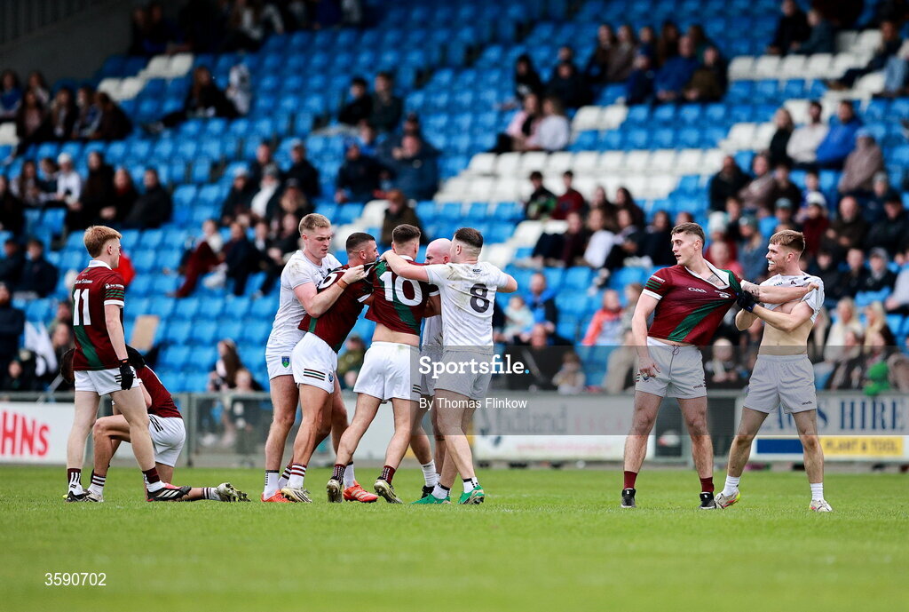 11 October 2026; Players tussle during the Laois County Senior Club Football Championship final match between Courtwood and Portarlington at Laois Hire O'Moore Park in Portlaoise, Laois. Photo by Thomas Flinkow/Sportsfile