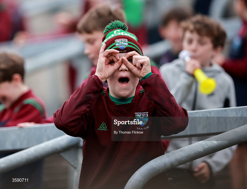 11 October 2026; A young Portarlington supporter gestures towards Courtwood supporters after his side's first goal of the match, scored by Colm Murphy, during the Laois County Senior Club Football Championship final match between Courtwood and Portarlington at Laois Hire O'Moore Park in Portlaoise, Laois. Photo by Thomas Flinkow/Sportsfile