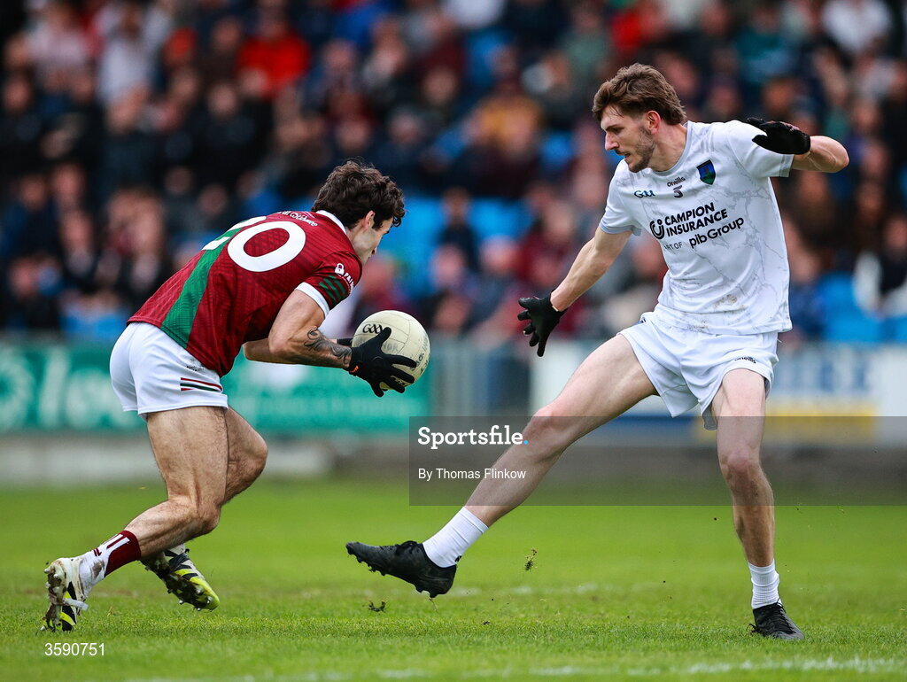 11 October 2026; Darragh Galvin of Portarlington in action against Daniel Boland of Courtwood during the Laois County Senior Club Football Championship final match between Courtwood and Portarlington at Laois Hire O'Moore Park in Portlaoise, Laois. Photo by Thomas Flinkow/Sportsfile