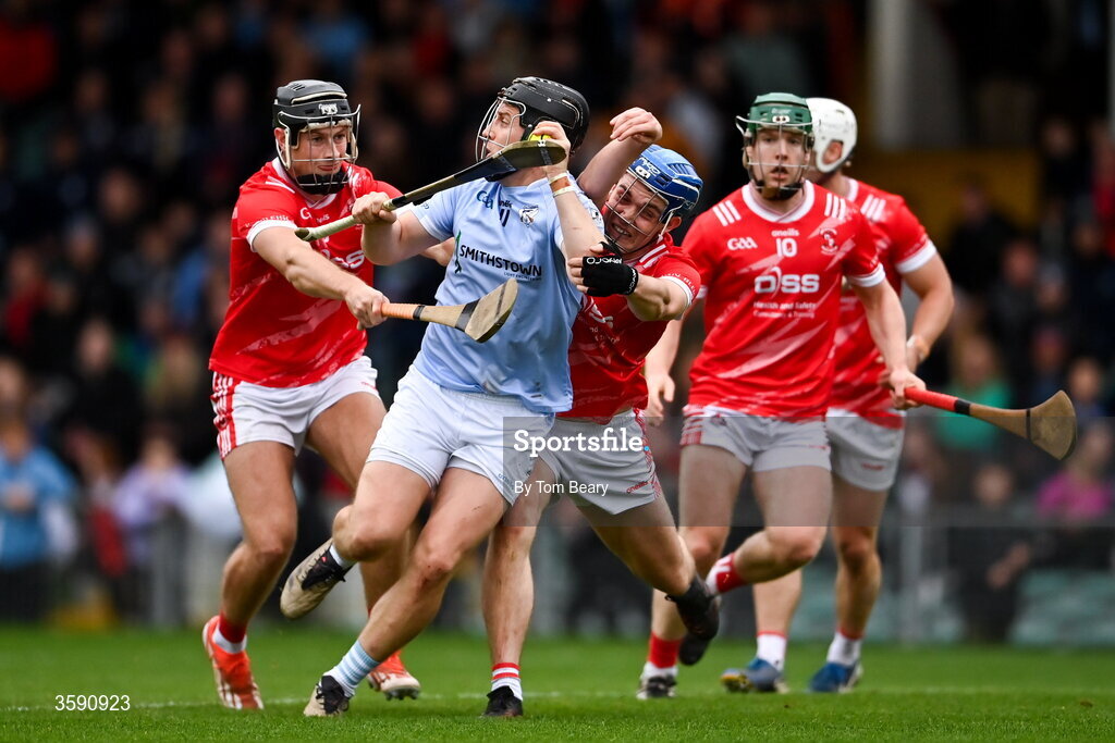 11 October 2026; Peter Casey of Na Piarsaigh is tackled by Barry Murphy, left, and Aidan O'Connell of Doon during the Limerick County Senior Hurling semi-final match between Doon and Na Piarsaigh at TUS Gaelic Grounds in Limerick. Photo by Tom Beary/Sportsfile