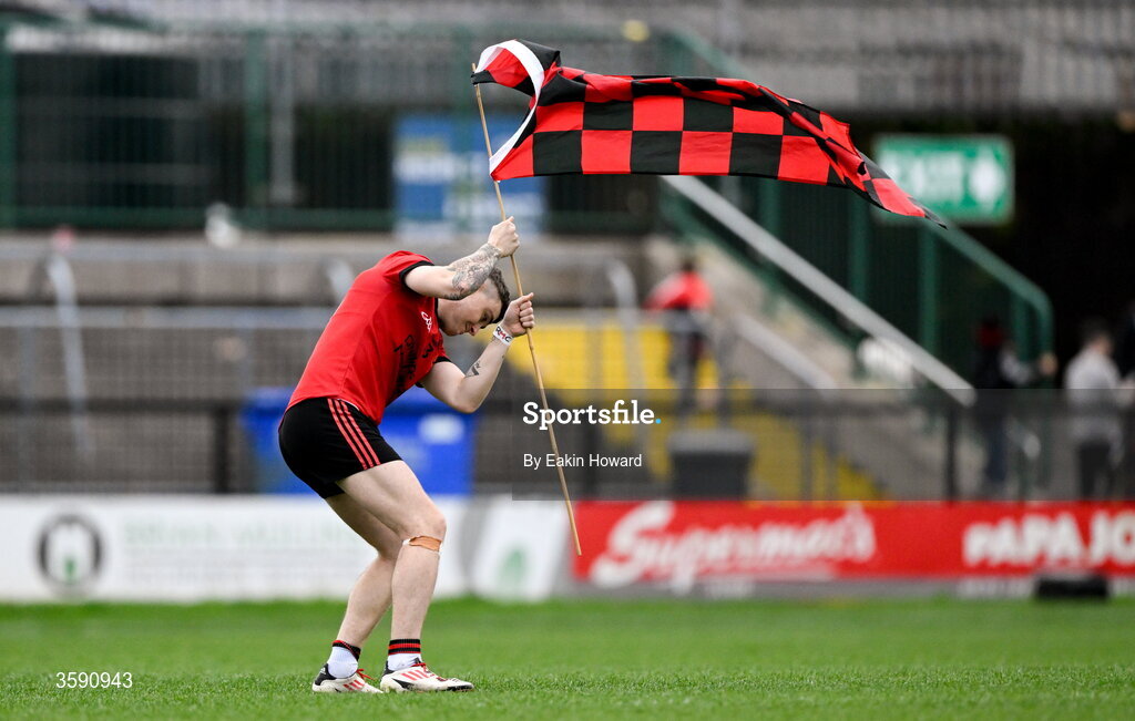 11 October 2026; Kyle Cawley of St Mary's plants a flag on the pitch after the Sligo County Senior Club Football Championship final match between Shamrock Gaels and St Mary's at Markievicz Park in Sligo. Photo by Eakin Howard/Sportsfile