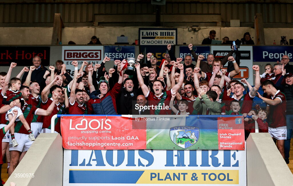 11 October 2026; Portarlington players celebrate with the cup after the Laois County Senior Club Football Championship final match between Courtwood and Portarlington at Laois Hire O'Moore Park in Portlaoise, Laois. Photo by Thomas Flinkow/Sportsfile