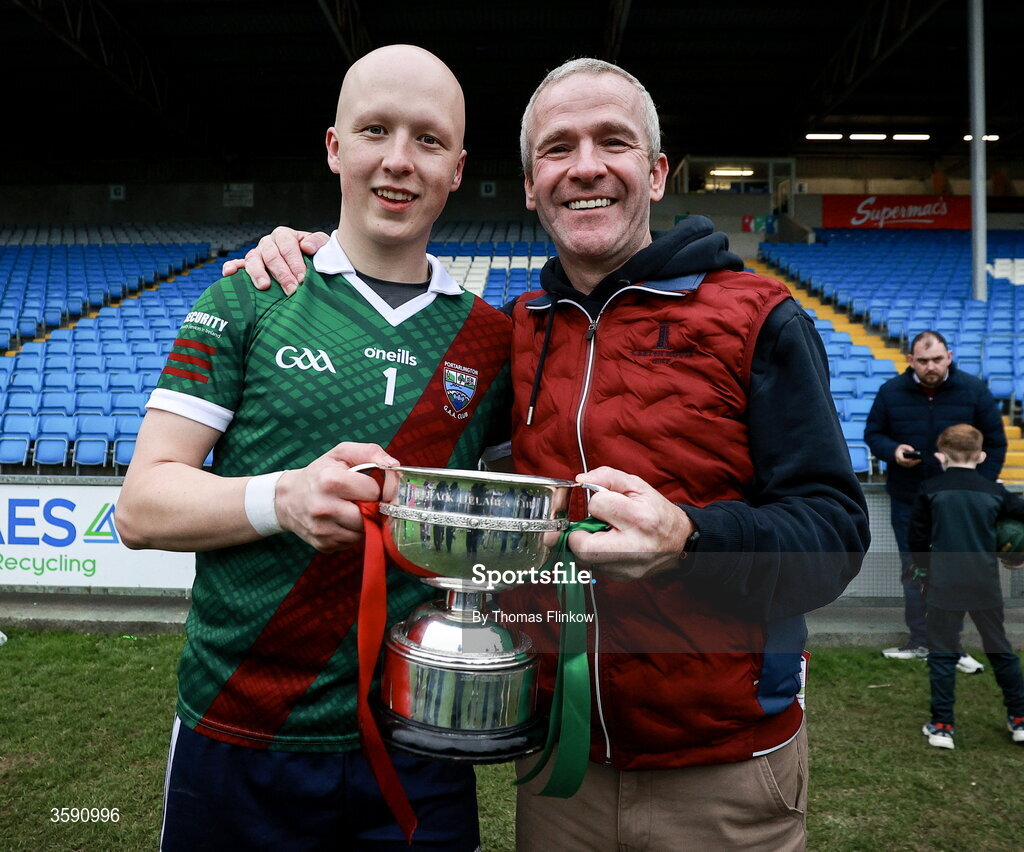 11 October 2026; Portarlington goalkeeper Evan Grattan celebrates with a supporter after the Laois County Senior Club Football Championship final match between Courtwood and Portarlington at Laois Hire O'Moore Park in Portlaoise, Laois. Photo by Thomas Flinkow/Sportsfile