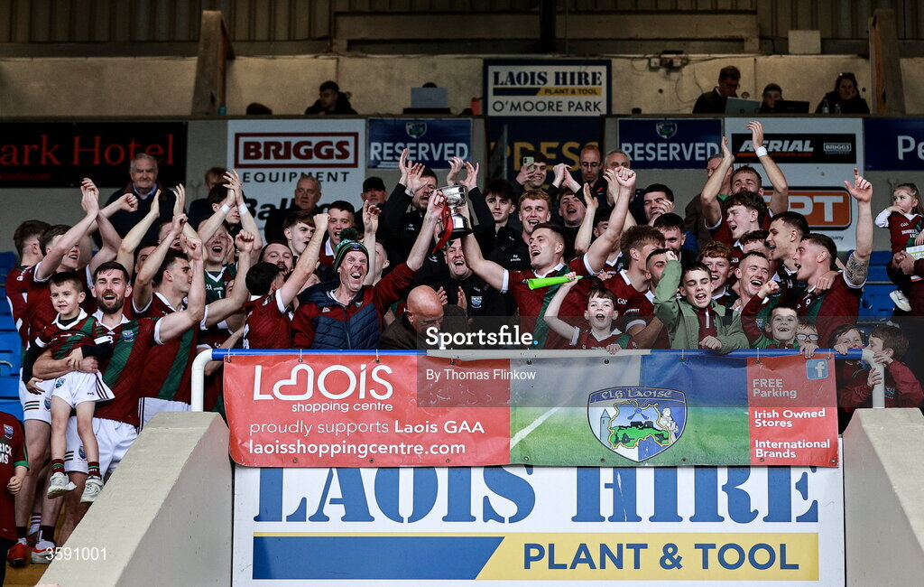 11 October 2026; Portarlington players lift the cup after the Laois County Senior Club Football Championship final match between Courtwood and Portarlington at Laois Hire O'Moore Park in Portlaoise, Laois. Photo by Thomas Flinkow/Sportsfile