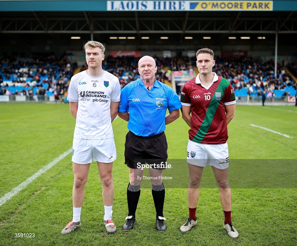 11 October 2026; Referee Des Cooney with Courtwood captain Seán O'Flynn and Portarlington captain Patrick O Sullivan before the Laois County Senior Club Football Championship final match between Courtwood and Portarlington at Laois Hire O'Moore Park in Portlaoise, Laois. Photo by Thomas Flinkow/Sportsfile