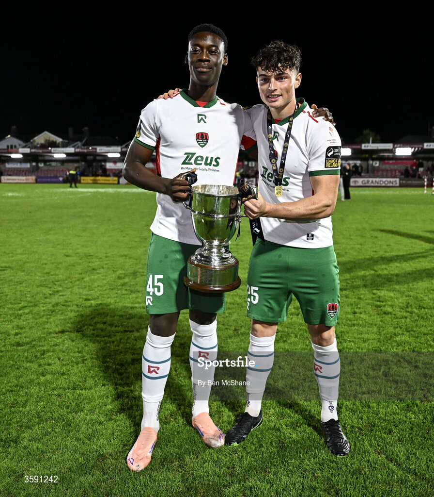 9 October 2026; Denzell Obenge, left, and Matthew Murray of Cork City with the SSE Airtrity Men's First Division trophy after the SSE Airtricity Men’s First Division match between Cork City and Finn Harps at Turner's Cross in Cork. Photo by Ben McShane/Sportsfile