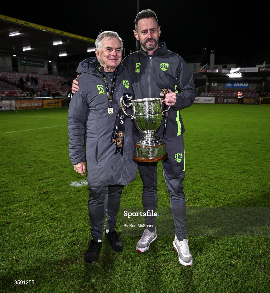 9 October 2026; Cork city team doctor Dr Gerard Murphy, left, and Cork City kit manager Mick Ring with the SSE Airtrity Men's First Division trophy after the SSE Airtricity Men’s First Division match between Cork City and Finn Harps at Turner's Cross in Cork. Photo by Ben McShane/Sportsfile