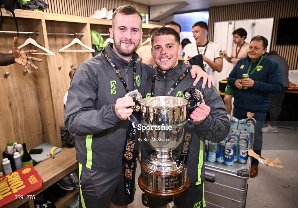 9 October 2026; Cork City strength and conditioning coach Alan Barry, left, and physiotherapist Isaac Coppel with the SSE Airtrity Men's First Division trophy after the SSE Airtricity Men’s First Division match between Cork City and Finn Harps at Turner's Cross in Cork. Photo by Ben McShane/Sportsfile