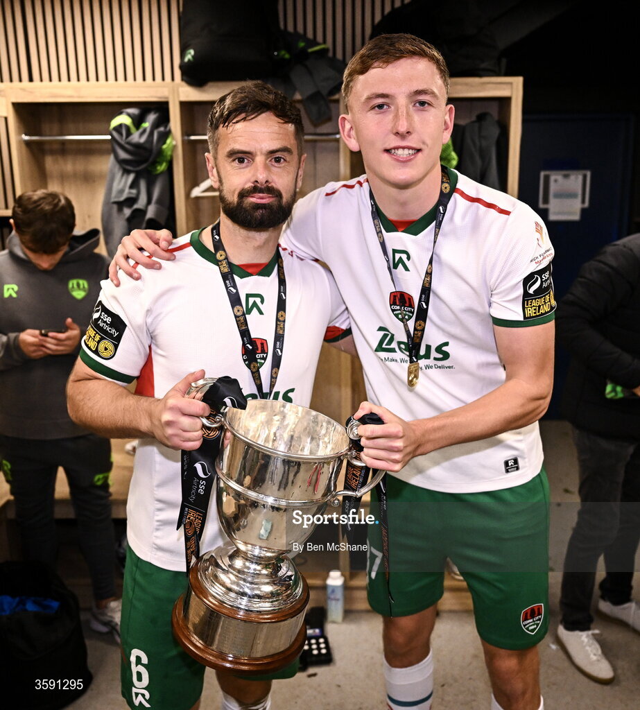 9 October 2026; Greg Bolger, left, and Luke Downey of Cork City with the SSE Airtrity Men's First Division trophy after the SSE Airtricity Men’s First Division match between Cork City and Finn Harps at Turner's Cross in Cork. Photo by Ben McShane/Sportsfile