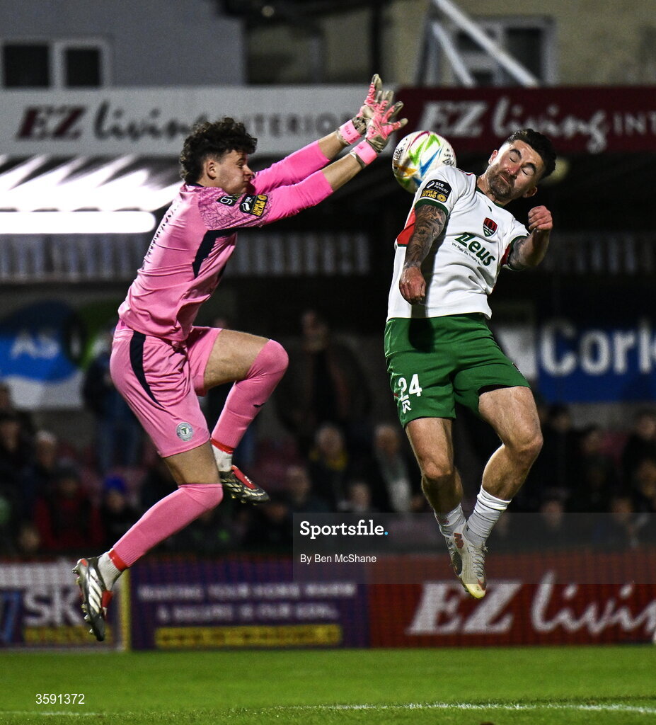 9 October 2026; Seani Maguire of Cork City and Finn Harps goalkeeper Corey Sheridan during the SSE Airtricity Men’s First Division match between Cork City and Finn Harps at Turner's Cross in Cork. Photo by Ben McShane/Sportsfile