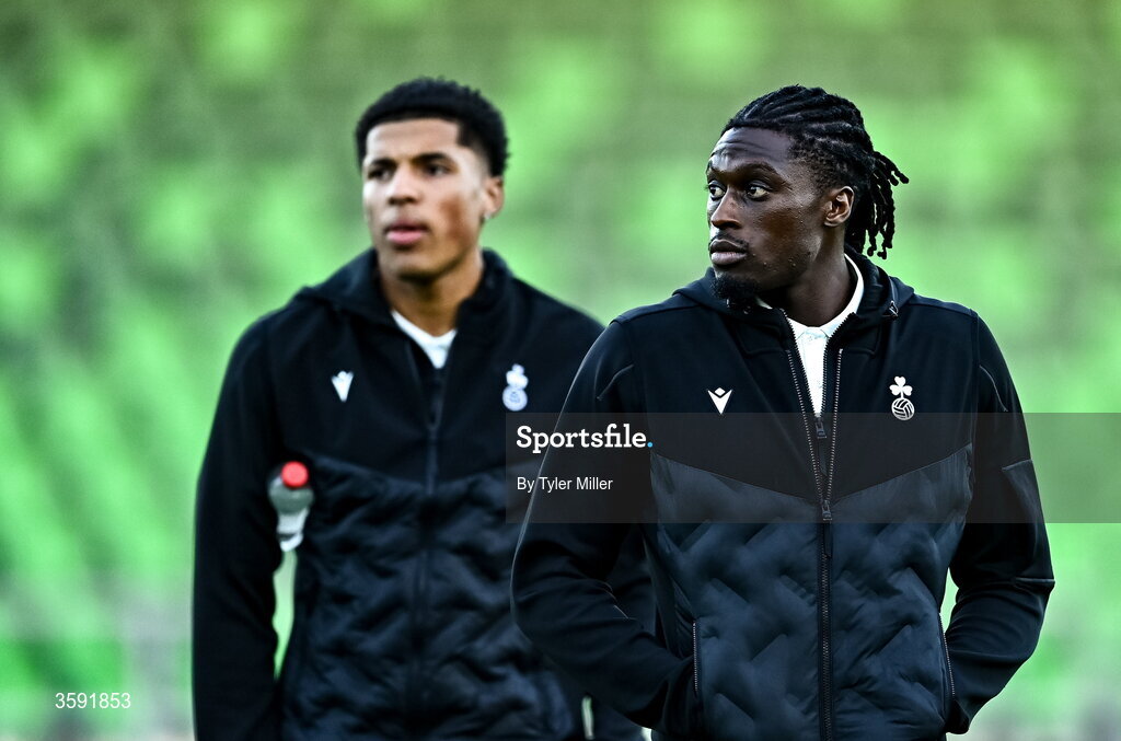 12 October 2026; Tunmise Sobowale of Shamrock Rovers, right, and Shamrock Rovers goalkeeper Todd Bazunu during the SSE Airtricity Men's Premier Division match between Shamrock Rovers and Bohemians at Tallaght Stadium in Dublin. Photo by Tyler Miller/Sportsfile