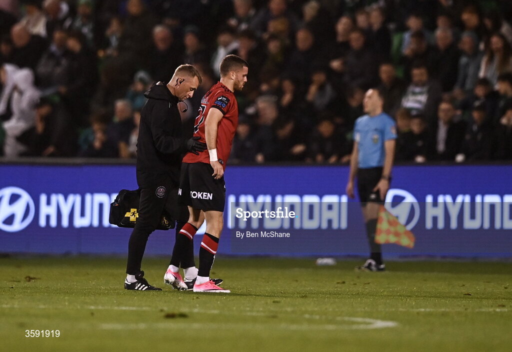 12 October 2026; Adam McDonnell of Bohemians is led off the pitch injured during the SSE Airtricity Men's Premier Division match between Shamrock Rovers and Bohemians at Tallaght Stadium in Dublin. Photo by Ben McShane/Sportsfile