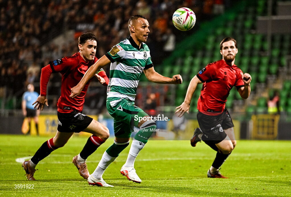 12 October 2026; Graham Burke of Shamrock Rovers in action against Dawson Devoy, left, and Ryan Burke of Bohemians during the SSE Airtricity Men's Premier Division match between Shamrock Rovers and Bohemians at Tallaght Stadium in Dublin. Photo by Tyler Miller/Sportsfile