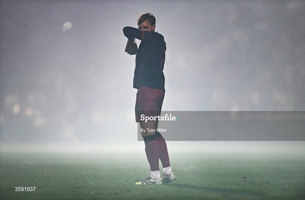 12 October 2026; Bohemians goalkeeper Paul Walters covers his mouth due to flare smoke during the SSE Airtricity Men's Premier Division match between Shamrock Rovers and Bohemians at Tallaght Stadium in Dublin. Photo by Tyler Miller/Sportsfile