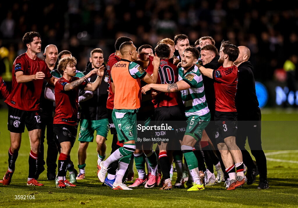 12 October 2026; Graham Burke and Lee Grace of Shamrock Rovers restrain Dawson Devoy of Bohemians after the final whistle during the SSE Airtricity Men's Premier Division match between Shamrock Rovers and Bohemians at Tallaght Stadium in Dublin. Photo by Ben McShane/Sportsfile