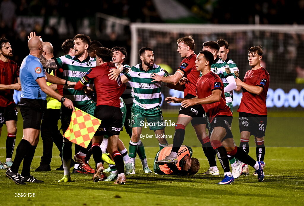 12 October 2026; Lee Grace of Shamrock Rovers restains Dawson Devoy of Bohemians after an altercation with Michael Noonan of Shamrock Rovers, who lies on the ground, after the SSE Airtricity Men's Premier Division match between Shamrock Rovers and Bohemians at Tallaght Stadium in Dublin. Photo by Ben McShane/Sportsfile
