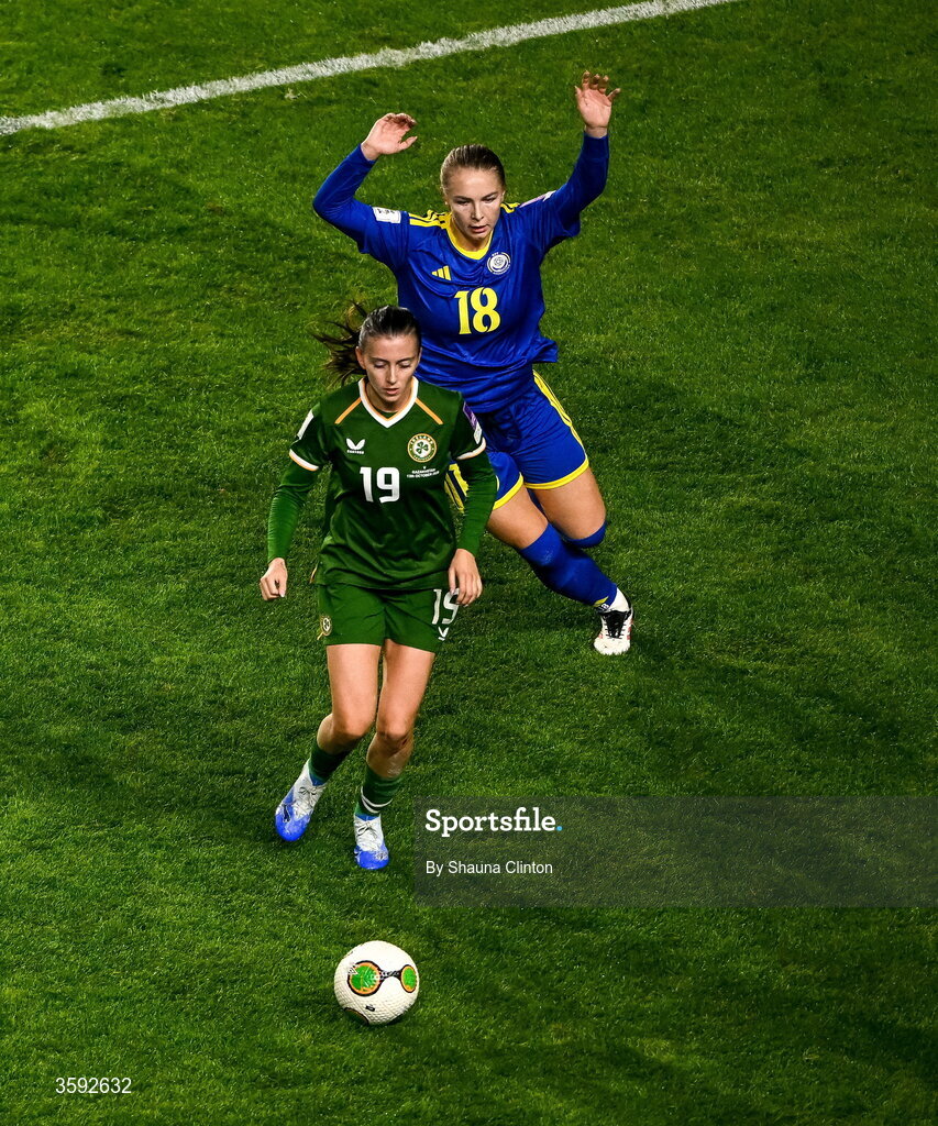13 October 2026; Abbie Larkin of Republic of Ireland in action against Alexandra Burova of Kazakhstan during the 2027 FIFA Women’s World Cup qualifying round 1 play-off second leg match between the Republic of Ireland and Kazakhstan at Páirc Uí Chaoimh in Cork. Photo by Shauna Clinton/Sportsfile