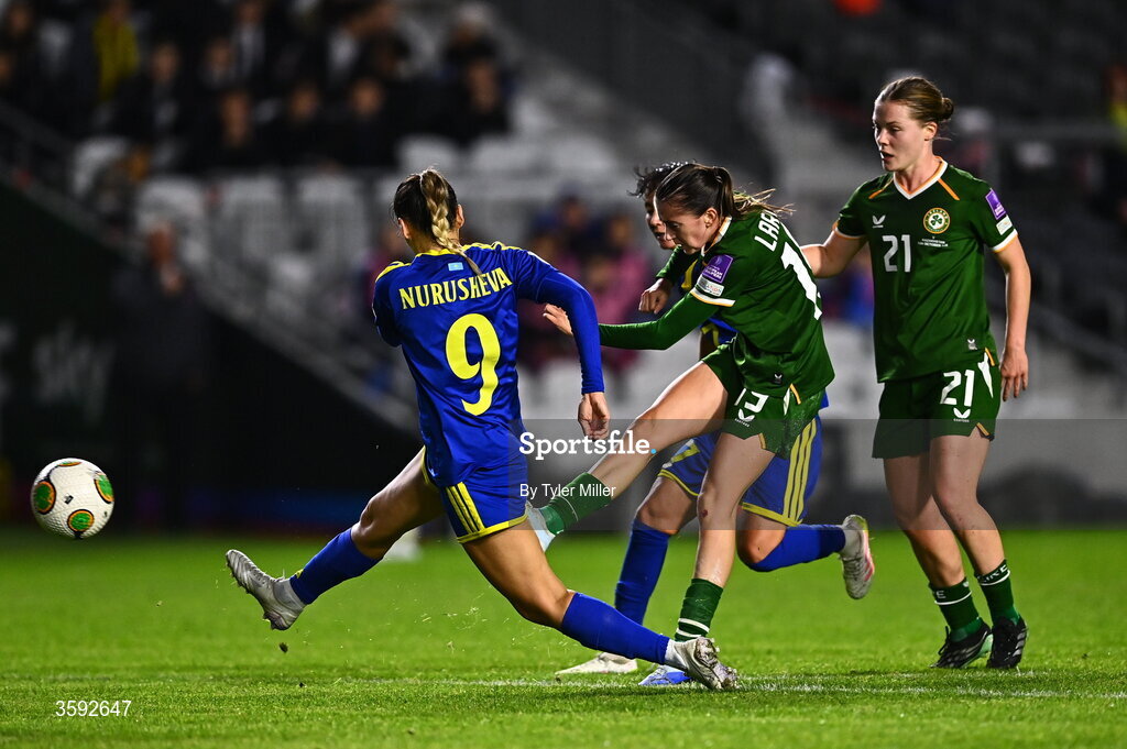 13 October 2026; Abbie Larkin of Republic of Ireland has a shot on goal despite the attention of Bibigul Nurusheva of Kazakhstan, 9, during the 2027 FIFA Women’s World Cup qualifying round 1 play-off second leg match between the Republic of Ireland and Kazakhstan at Páirc Uí Chaoimh in Cork. Photo by Tyler Miller/Sportsfile