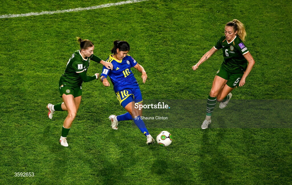 13 October 2026; Amina Bibossynova of Kazakhstan in action against Hayley Nolan, left, and Megan Connolly of Republic of Ireland during the 2027 FIFA Women’s World Cup qualifying round 1 play-off second leg match between the Republic of Ireland and Kazakhstan at Páirc Uí Chaoimh in Cork. Photo by Shauna Clinton/Sportsfile