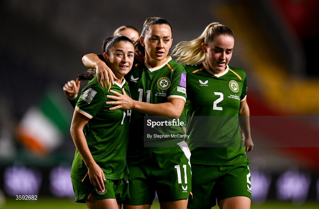 13 October 2026; Katie McCabe of Republic of Ireland celebrates with teammates Marissa Sheva, left, and Jessie Stapleton after scoring their side's second goal during the 2027 FIFA Women’s World Cup qualifying round 1 play-off second leg match between Republic of Ireland and Kazakhstan at SuperValu Páirc Uí Chaoimh in Cork. Photo by Stephen McCarthy/Sportsfile