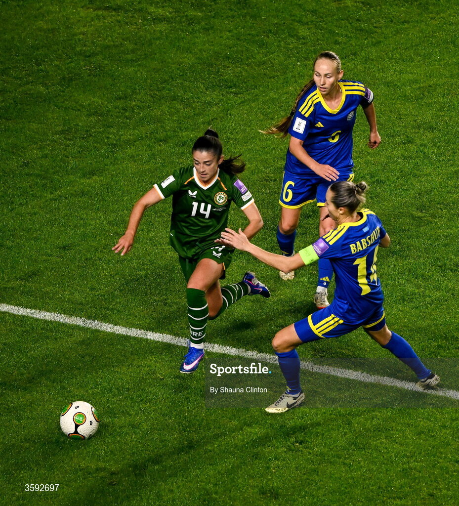 13 October 2026; Marissa Sheva of Republic of Ireland in action against Anastassiya Nizamutdinova, top, and Yekaterina Babshuk of Kazakhstan during the 2027 FIFA Women’s World Cup qualifying round 1 play-off second leg match between the Republic of Ireland and Kazakhstan at Páirc Uí Chaoimh in Cork. Photo by Shauna Clinton/Sportsfile