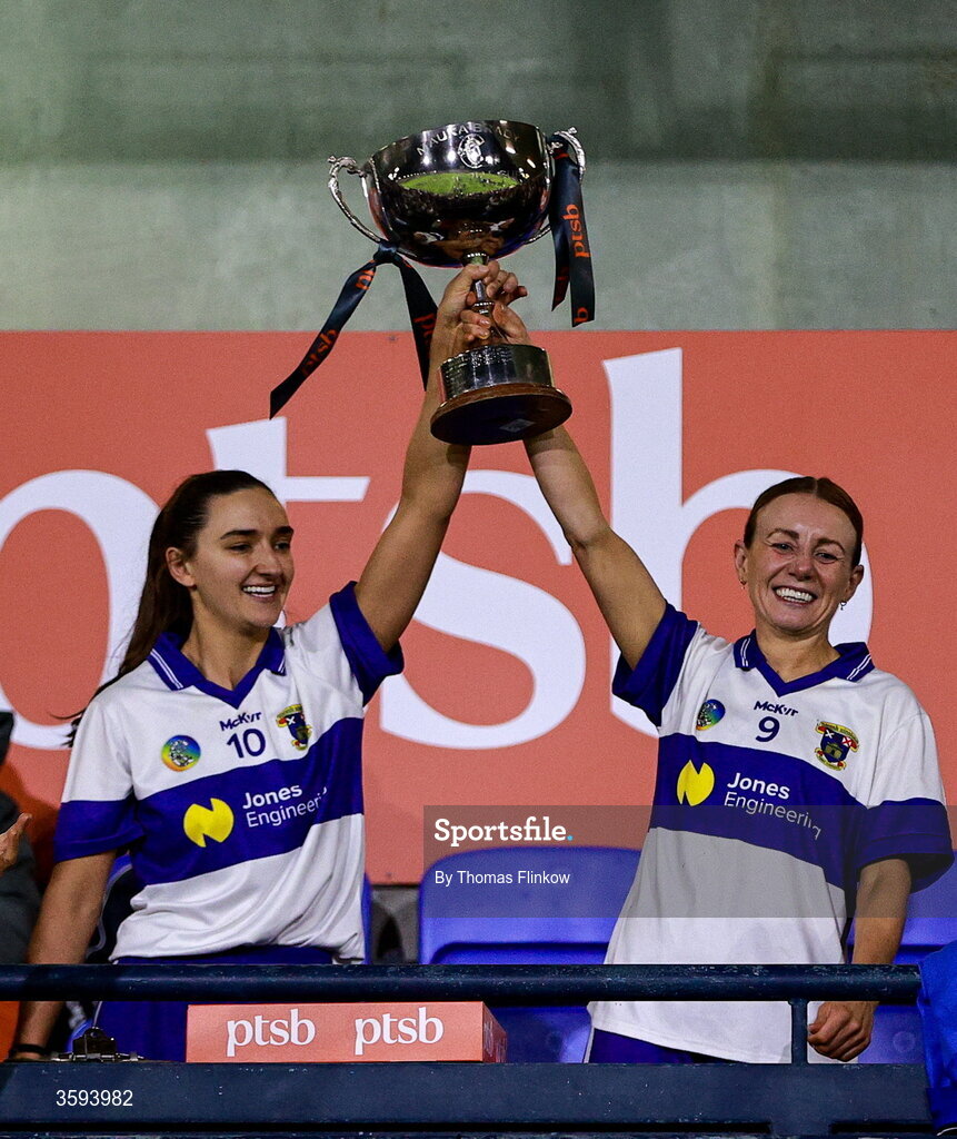16 October 2026; St Vincent's joint captains Aine Woods, left, and Danielle Smith lift the trophy after their side's victory in the PTSB Dublin Senior Club Hurling final match between St Vincent's and St Jude's at Parnell Park in Dublin. Photo by Thomas Flinkow/Sportsfile