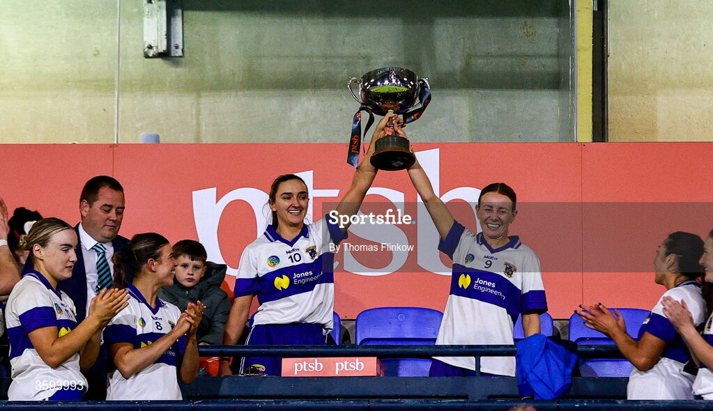 16 October 2026; St Vincent's joint captains Aine Woods, left, and Danielle Smith lift the trophy after their side's victory in the PTSB Dublin Senior Club Hurling final match between St Vincent's and St Jude's at Parnell Park in Dublin. Photo by Thomas Flinkow/Sportsfile