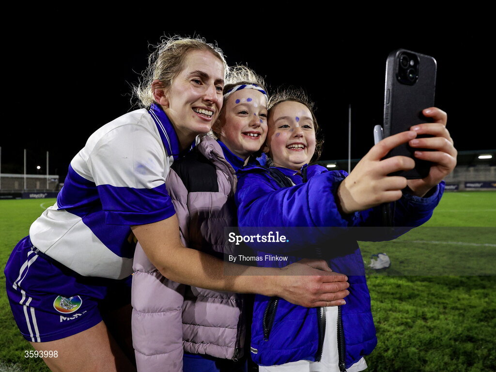 16 October 2026; Muireann Kelleher of St Vincent's has her photo taken with supporters after the PTSB Dublin Senior Club Hurling final match between St Vincent's and St Jude's at Parnell Park in Dublin. Photo by Thomas Flinkow/Sportsfile