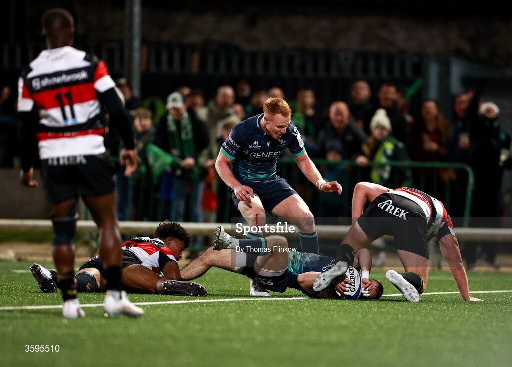 17 October 2026; Caolin Blade of Connacht scores his side's sixth try despite the attention of Saracens players, from left, Noah Caluori and Owen Farrell during the Investec Champions Cup Round 1 match between Connacht and Saracens at Dexcom Stadium in Galway. Photo by Thomas Flinkow/Sportsfile