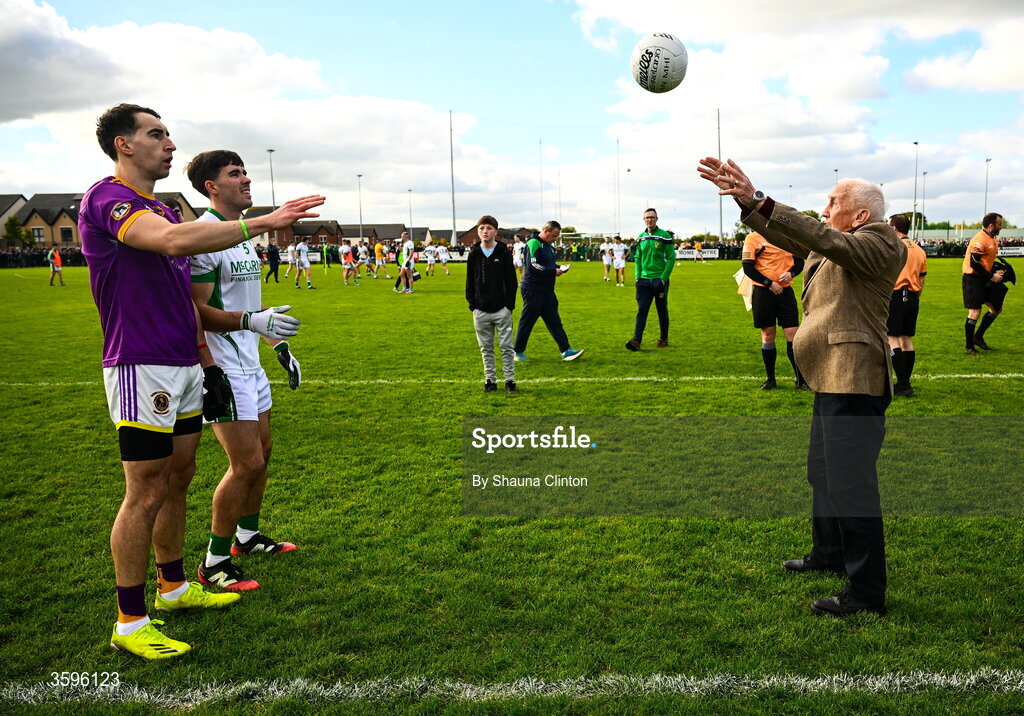18 October 2026; Former Meath manager and All-Ireland Football champion Sean Boylan takes part in the ceremonial toss with Wolfe Tones captain Shane McGlynn and Donaghmore/ Ashbourne captain Evan Quinn before the Meath County Senior Club Football Championship final match between Wolfe Tones and Donaghmore/ Ashbourne at Donaghmore-Ashbourne GAA Club in Ashbourne, Meath. Photo by Shauna Clinton/Sportsfile