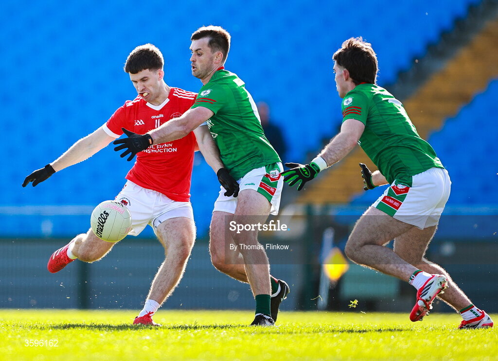 18 October 2026; Lorcán Daly of Pádraig Pearses attempts a shot on goal despite the attention of Brian Stack of St Brigid's during the Roscommon County Senior Club Football Championship final match between Pádraig Pearses and St Brigid's at King & Moffatt Dr Hyde Park in Roscommon. Photo by Thomas Flinkow/Sportsfile