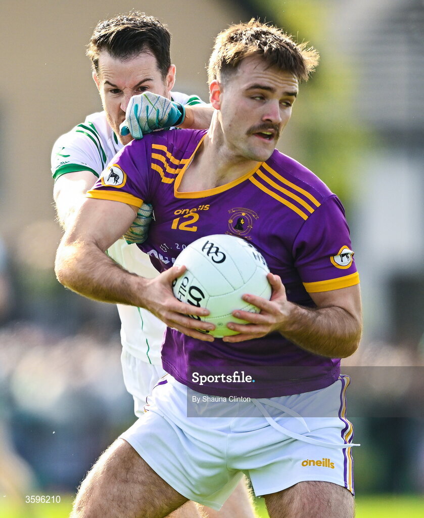 18 October 2026; Sarán O Fionnagáin of Wolfe Tones in action against Sean Curran of Donaghmore/ Ashbourne during the Meath County Senior Club Football Championship final match between Wolfe Tones and Donaghmore/ Ashbourne at Donaghmore-Ashbourne GAA Club in Ashbourne, Meath. Photo by Shauna Clinton/Sportsfile