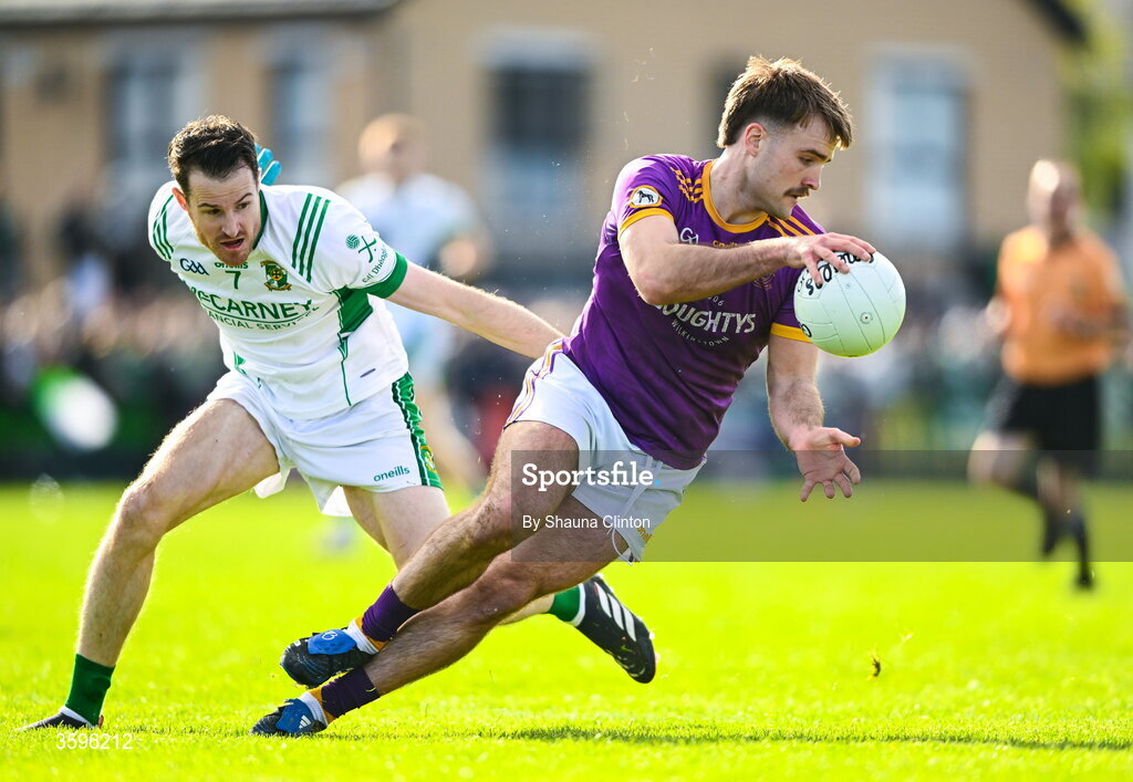 18 October 2026; Sarán O Fionnagáin of Wolfe Tones in action against Sean Curran of Donaghmore/ Ashbourne during the Meath County Senior Club Football Championship final match between Wolfe Tones and Donaghmore/ Ashbourne at Donaghmore-Ashbourne GAA Club in Ashbourne, Meath. Photo by Shauna Clinton/Sportsfile