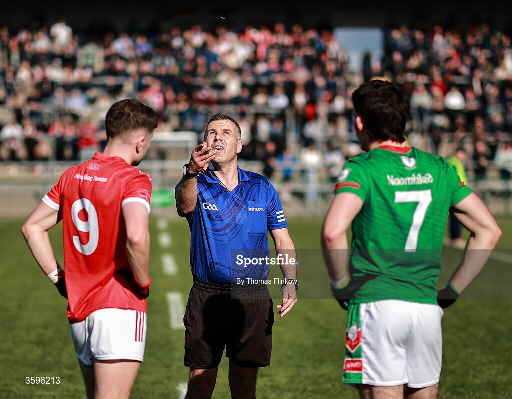 18 October 2026; Referee Dermot Lyons performs the coin toss in the presence of Pádraig Pearses captain Declan Kenny and Ruaidhri Fallon before the Roscommon County Senior Club Football Championship final match between Pádraig Pearses and St Brigid's at King & Moffatt Dr Hyde Park in Roscommon. Photo by Thomas Flinkow/Sportsfile