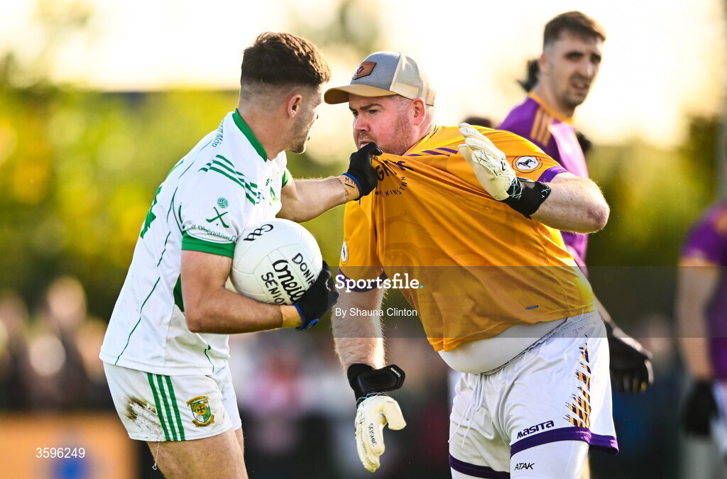 18 October 2026; Wolfe Tones goalkeeper Ciaráin Ó Gallachóir and Stephen Carton of Donaghmore/ Ashbourne tussle during the Meath County Senior Club Football Championship final match between Wolfe Tones and Donaghmore/ Ashbourne at Donaghmore-Ashbourne GAA Club in Ashbourne, Meath. Photo by Shauna Clinton/Sportsfile