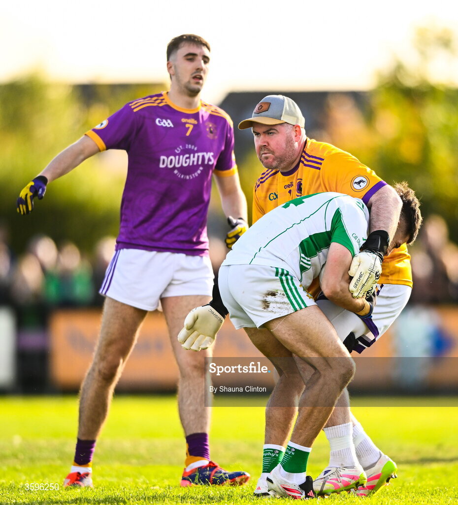 18 October 2026; Wolfe Tones goalkeeper Ciaráin Ó Gallachóir and Stephen Carton of Donaghmore/ Ashbourne tussle during the Meath County Senior Club Football Championship final match between Wolfe Tones and Donaghmore/ Ashbourne at Donaghmore-Ashbourne GAA Club in Ashbourne, Meath. Photo by Shauna Clinton/Sportsfile