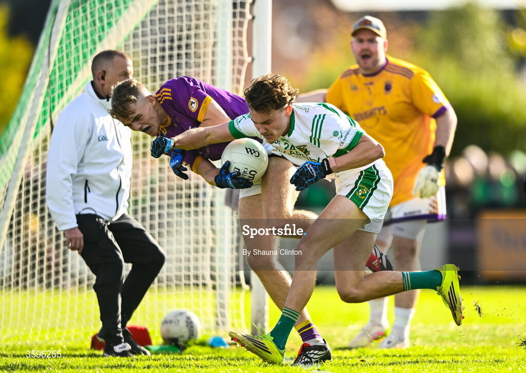 18 October 2026; Andrew Crawford of Wolfe Tones is tackled by Sean Tyrrell of Donaghmore/ Ashbourne during the Meath County Senior Club Football Championship final match between Wolfe Tones and Donaghmore/ Ashbourne at Donaghmore-Ashbourne GAA Club in Ashbourne, Meath. Photo by Shauna Clinton/Sportsfile