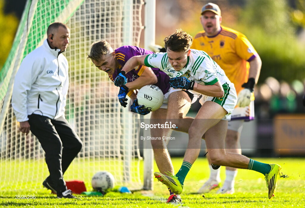 18 October 2026; Andrew Crawford of Wolfe Tones is tackled by Sean Tyrrell of Donaghmore/ Ashbourne during the Meath County Senior Club Football Championship final match between Wolfe Tones and Donaghmore/ Ashbourne at Donaghmore-Ashbourne GAA Club in Ashbourne, Meath. Photo by Shauna Clinton/Sportsfile